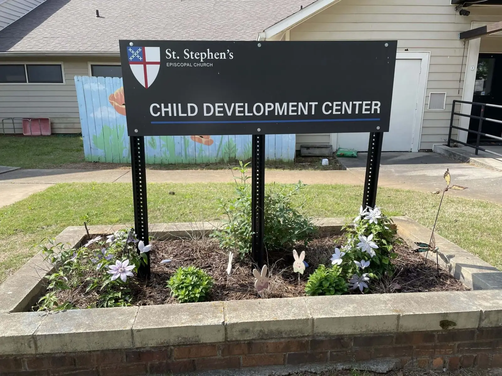 Sign for St. Stephen's Child Development Center outside a building.
